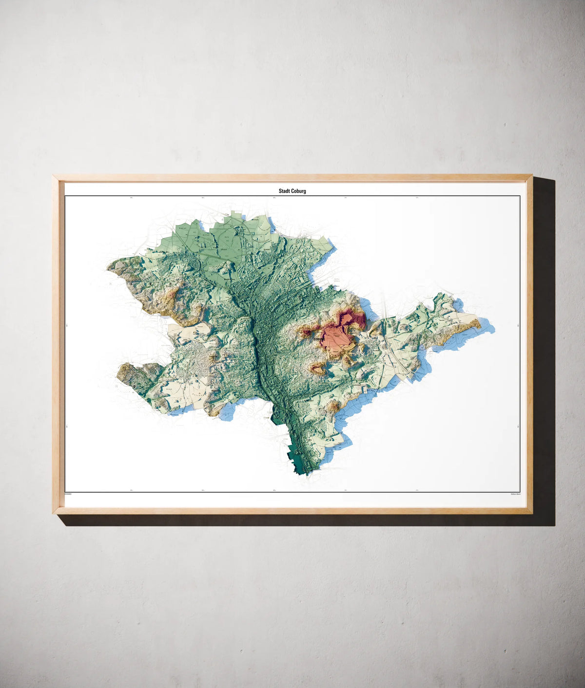 Stadt Coburg Poster als schattierte Reliefkarte, Farbvariante Petrol, gerahmt an einer Wand #c2