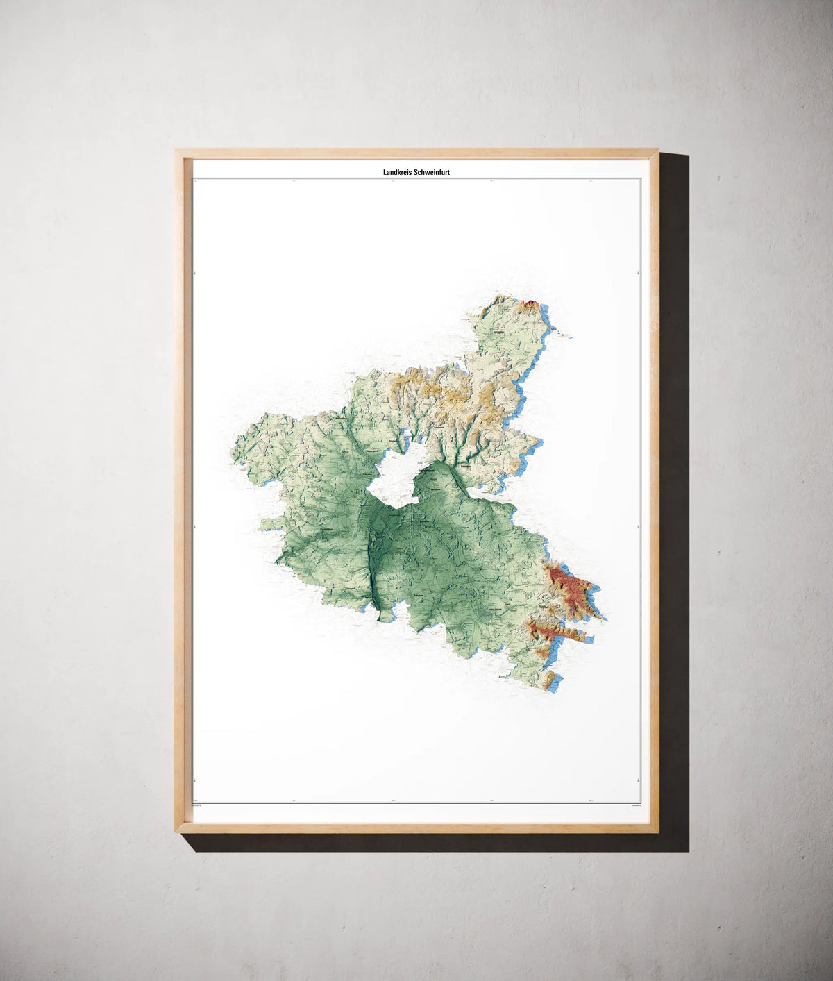 Landkreis Schweinfurt Poster als schattierte Reliefkarte, Farbvariante Petrol, gerahmt an einer Wand #c2