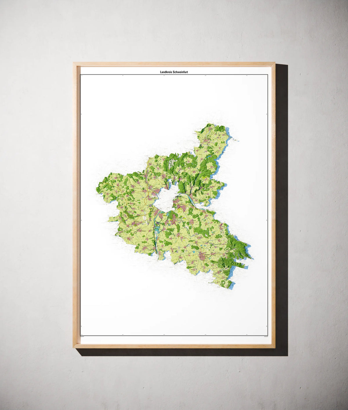 Landkreis Schweinfurt Poster als schattierte Reliefkarte, Farbvariante Topographisch, gerahmt an einer Wand #dtk