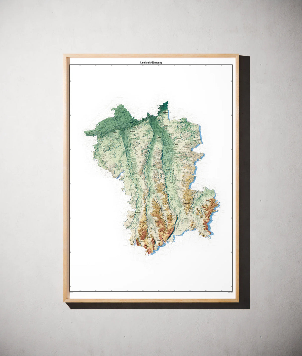 Landkreis Günzburg Poster als schattierte Reliefkarte, Farbvariante Petrol, gerahmt an einer Wand #c2